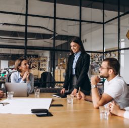 Group of people working out business plan in an office